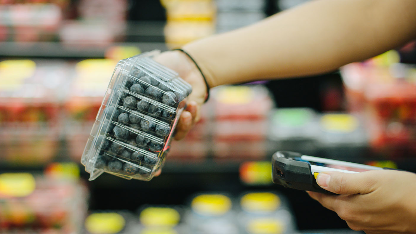 A carton of blueberries is scanned after being traced from farm to store on the IBM Food Trust blockchain network