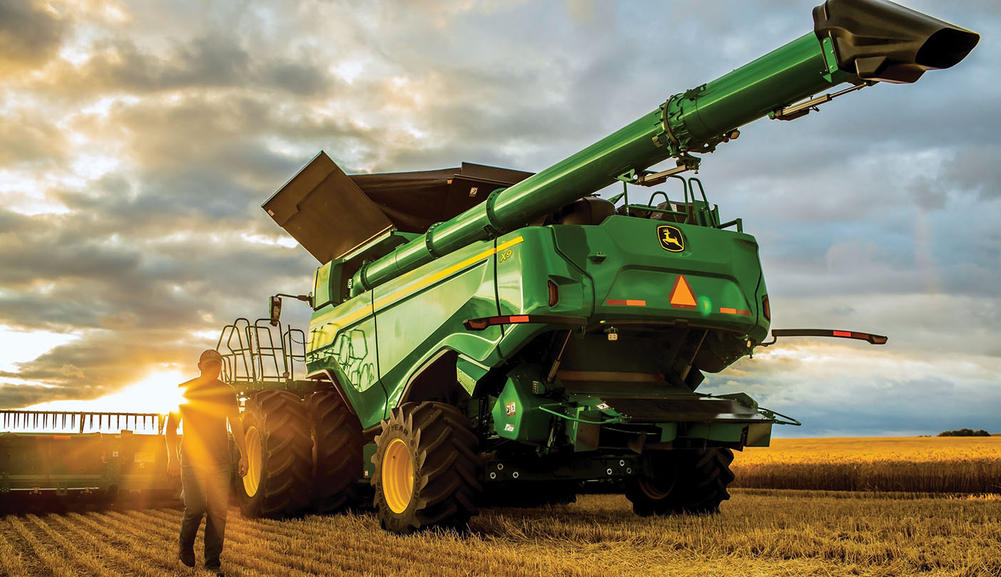 A John Deere X9 combine during harvest