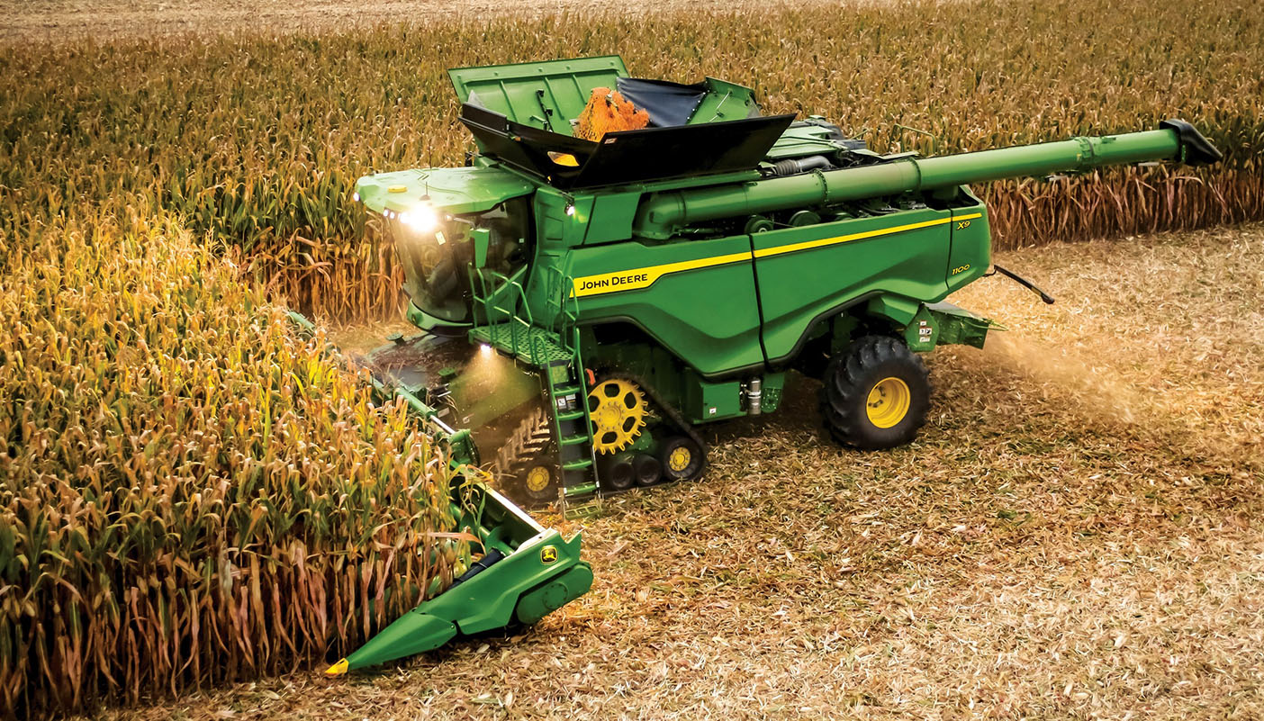  A John Deere X Series combine harvesting corn