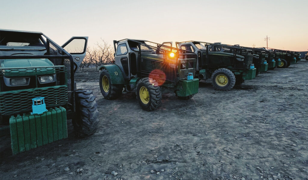 Fleet of tractors outfitted with Fieldin autonomy kits equipped with an Ouster OS1 sensor.